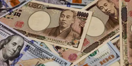 الدولار يتجاوز 160 يناً يابانياً